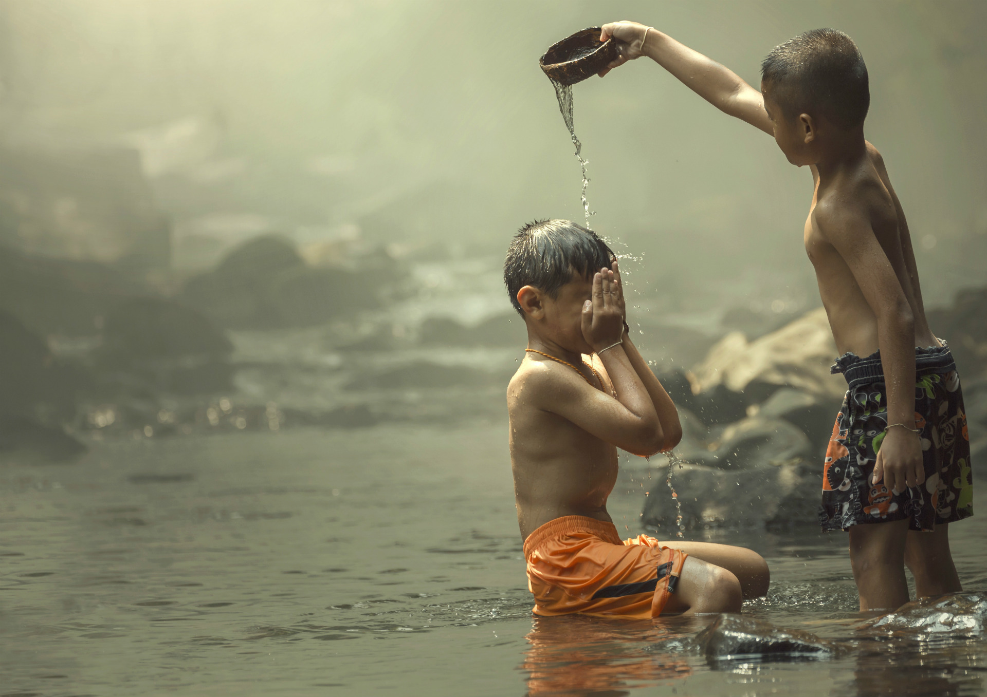 Boys showering together